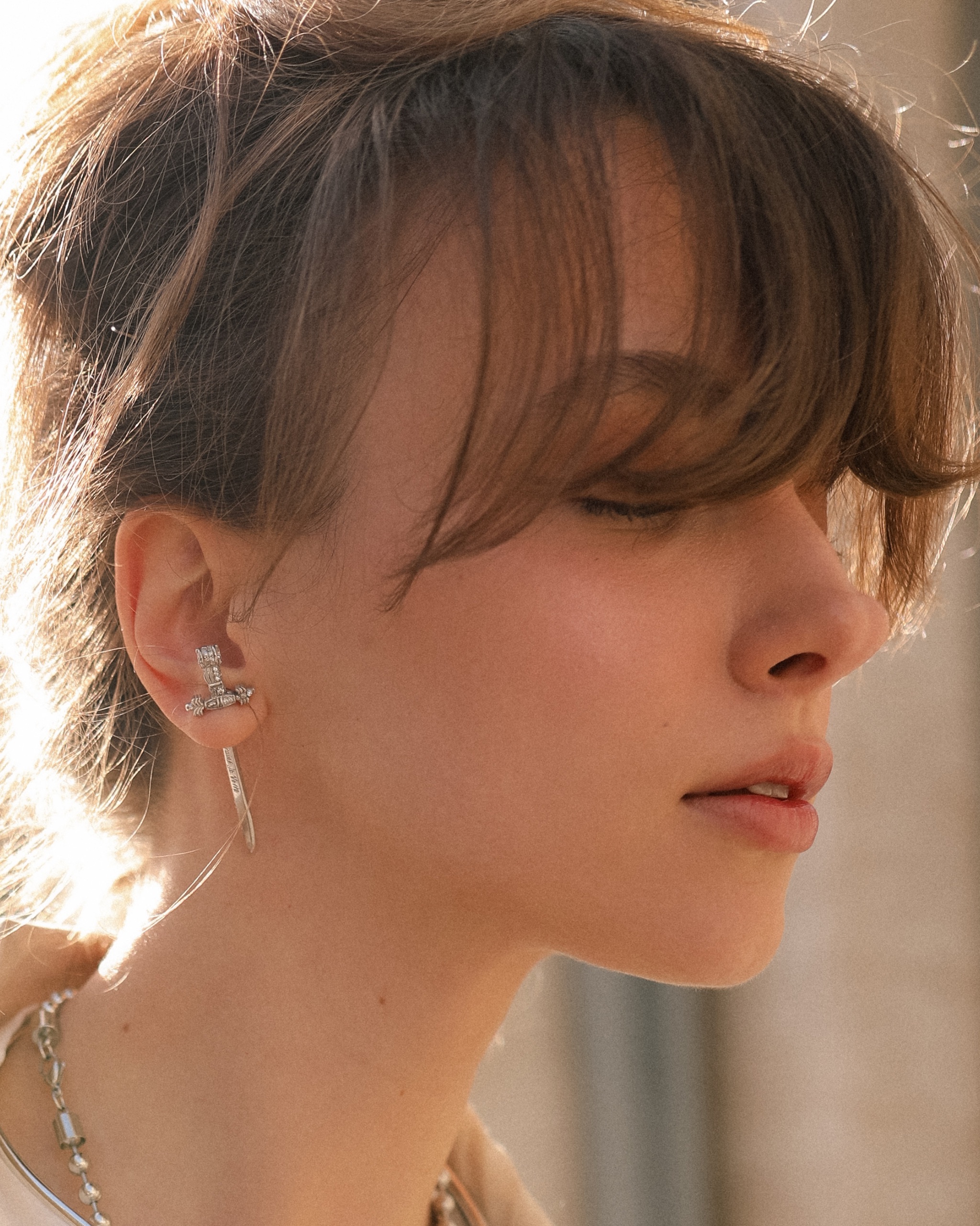 “LOVE BLADE” MONO EARRING WHITE ZIRCON SILVER